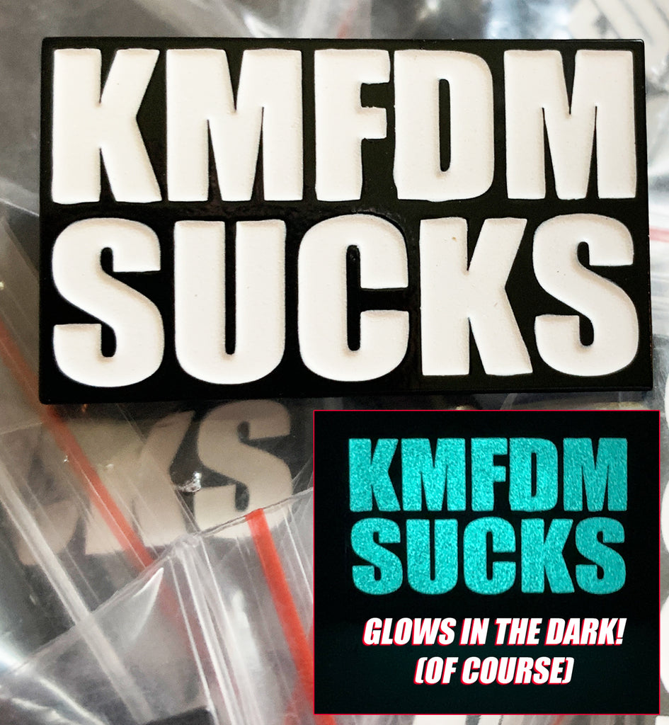"KMFDM SUCKS" Glow-In-The-Dark Pin - NEW!!!